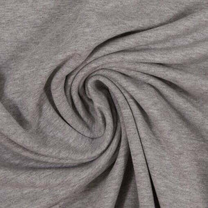 Geflochtene Bettschlange aus Jersey in Melange-Design von Mein Shop, drapiert auf einem Bett.