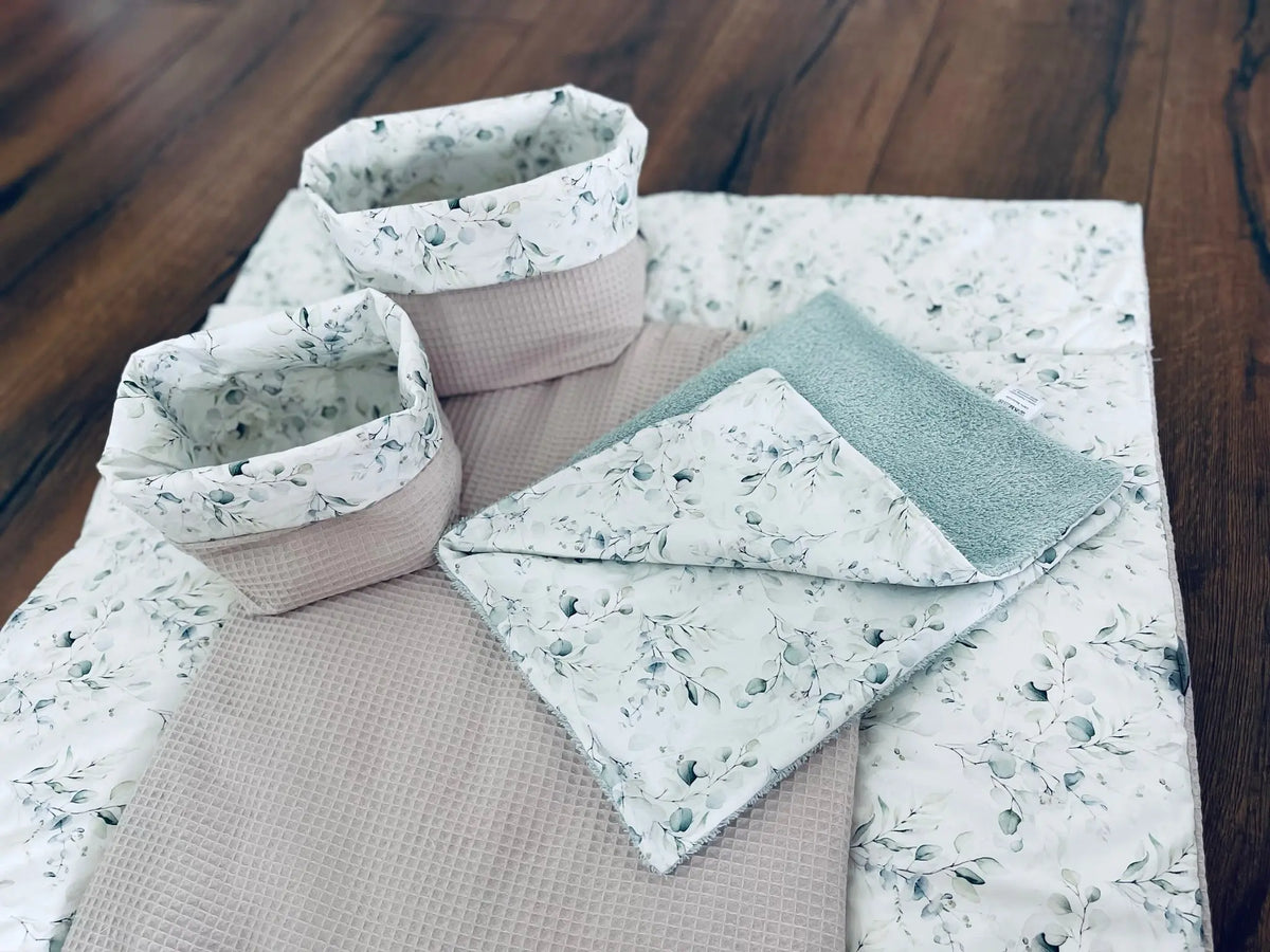 Weiche Wickelauflage von Mein Shop, Teil einer Bildergalerie, mit gestepptem Muster und weichem Bezug für Babys.