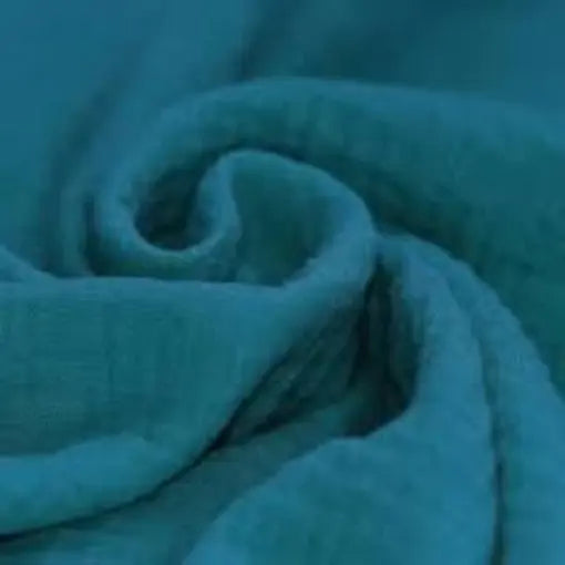 Bio XXL-Schal aus Musselin mit Knopf, variabler Design, weiches Bio-Material, ideales Musslintuch für Damen.