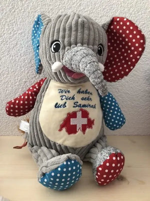 Bunter Elefant Harlequin aus Stoff, variabler Spielzeugartikel von Mein Shop, detailreiche Näharbeiten und bunte Muster.