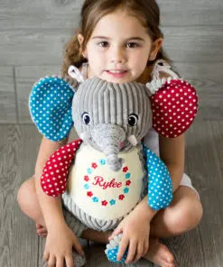 Harlekin Elefant aus der Mein Shop Kollektion, variabler Spielzeugelefant mit bunt gemustertem Design, frontal sichtbar.