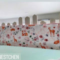 Nestchen für Babybett in verschiedenen Varianten, weiche Polsterung, Schutz für Babys, von Mein Shop, auf einem Bett liegend